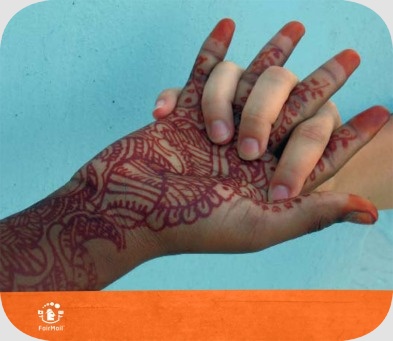 Fair Trade Photo Greeting Card Activity, Asia, Blue, Closeup, Colour image, Cooperation, Culture, Discrimination, Ethnic-folklore, Food and alimentation, Friendship, Fruits, Hand, Henna, Holding hands, Horizontal, India, Integration, Love, Orange, Solidarity, Tattoo, Together, Tolerance, Unity, Values