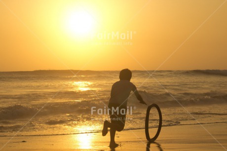 Fair Trade Photo Activity, Beach, Colour image, Emotions, Happiness, Holiday, Horizontal, Peru, Playing, Sea, South America, Summer, Sunset