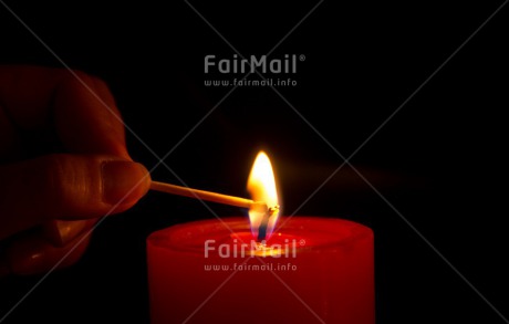 Fair Trade Photo Candle, Christmas, Closeup, Colour image, Condolence-Sympathy, Flame, Hand, Horizontal, Match, Peru, Red, Shooting style, South America