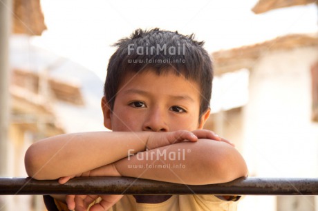 Fair Trade Photo Activity, Colour image, Emotions, Health, Horizontal, Looking at camera, One boy, People, Peru, Portrait headshot, Sadness, Safety, South America, Streetlife