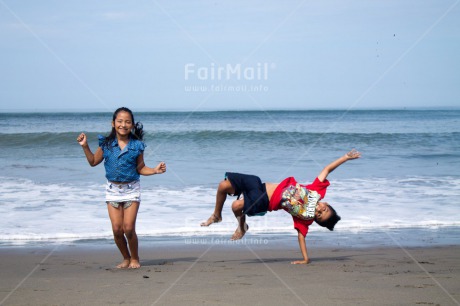 Fair Trade Photo Activity, Beach, Colour image, Cooperation, Emotions, Friendship, Happiness, Horizontal, Love, People, Peru, Playing, Sea, South America, Summer, Together, Two children