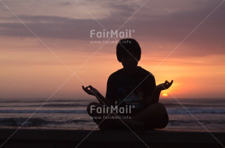 Fair Trade Photo Activity, Colour image, Evening, Health, Horizontal, Meditating, One boy, Outdoor, Peace, People, Peru, Shooting style, Silhouette, South America, Sunset, Yoga