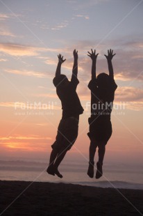 Fair Trade Photo Activity, Colour image, Emotions, Friendship, Happiness, Jumping, Peru, Playing, Shooting style, Silhouette, South America, Sunset, Vertical