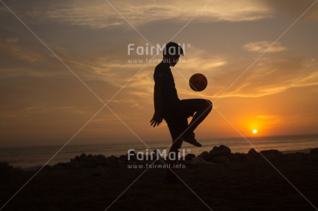 Fair Trade Photo Ball, Colour image, Horizontal, One boy, People, Peru, Shooting style, Silhouette, Soccer, South America, Sport, Sunset