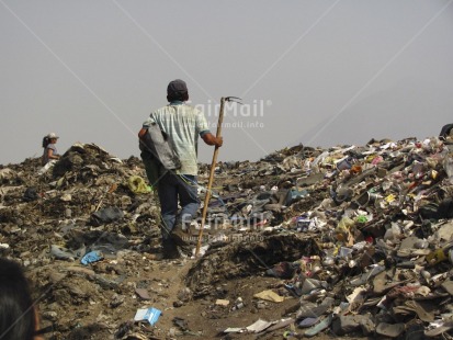 Fair Trade Photo Activity, Casual clothing, Clothing, Colour image, Day, Garbage, Garbage belt, Horizontal, Looking away, One man, One woman, Outdoor, People, Peru, Portrait fullbody, South America, Walking