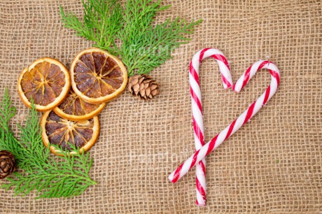 Fair Trade Photo Candy stick, Christmas, Christmas decoration, Colour, Colour image, Food and alimentation, Fruits, Horizontal, Object, Orange, Pine, Pine cone, Place, Red, South America, White