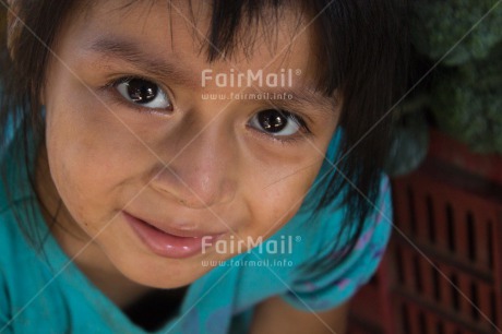 Fair Trade Photo 5 -10 years, Activity, Closeup, Colour image, Horizontal, Latin, Looking at camera, One girl, People, Peru, Portrait headshot, Smiling, South America
