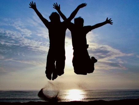 Fair Trade Photo Greeting Card 15-20_years, Action, Activity, Backlit, Beach, Clouds, Colour image, Cooperation, Emotions, Evening, Freedom, Friendship, Happiness, Horizontal, Jump, Jumping, Nature, Outdoor, People, Peru, Sand, Scenic, Sea, Silhouette, Sky, South America, Sun, Sunset, Together, Two boys, Two children, Water