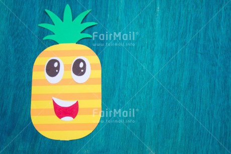 Fair Trade Photo Activity, Blue, Colour image, Emotions, Food and alimentation, Fruits, Funny, Happiness, Holiday, Horizontal, Laughing, Paper, Peru, Pineapple, Seasons, Smile, Smiling, South America, Summer