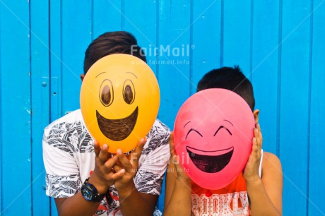 Fair Trade Photo Balloon, Birthday, Blue, Colour image, Colourful, Congratulations, Emotions, Face, Food and alimentation, Friendship, Fruits, Happiness, Happy, Horizontal, Orange, Outdoor, Party, People, Peru, Red, Smile, South America, Two, Two boys, Two people