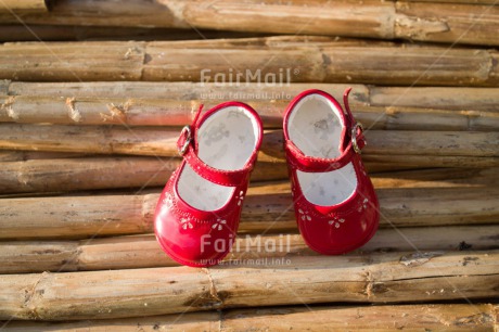 Fair Trade Photo Bamboo, Birth, Closeup, Colour image, Girl, Horizontal, New baby, People, Peru, Red, Shoe, Shooting style, South America