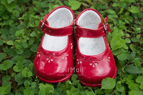 Fair Trade Photo Birth, Closeup, Colour image, Girl, Green, Horizontal, Leaf, New baby, People, Peru, Red, Shoe, Shooting style, South America
