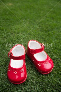 Fair Trade Photo Birth, Closeup, Colour image, Girl, Grass, Horizontal, New baby, People, Peru, Red, Shoe, Shooting style, South America, Vertical