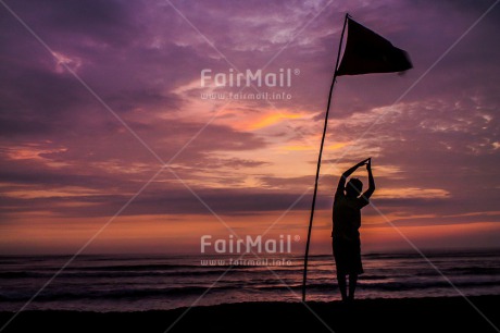 Fair Trade Photo Colour image, Flag, Horizontal, One boy, Peace, People, Shooting style, Silhouette, Spirituality, Sunset, Wellness, Yoga