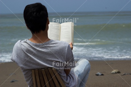 Fair Trade Photo Activity, Beach, Book, Colour image, Education, Holiday, Horizontal, Peru, Reading, Relaxing, Sea, South America, Travel