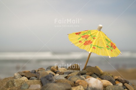 Fair Trade Photo Beach, Colour image, Day, Holiday, Horizontal, Ocean, Outdoor, Peru, Relax, Sea, Sky, South America, Stone, Umbrella, Water, Yellow