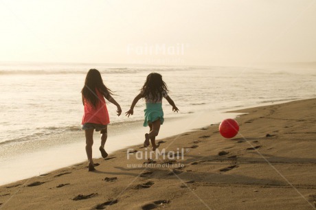 Fair Trade Photo 10-15 years, 5 -10 years, Activity, Ball, Beach, Children, Colour image, Day, Emotions, Evening, Friendship, Happiness, Holiday, Horizontal, Ocean, People, Peru, Playing, Running, Sand, Sea, Seasons, Sister, South America, Summer, Two, Water
