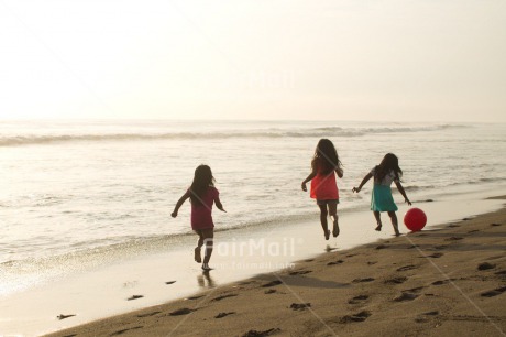 Fair Trade Photo 10-15 years, 5 -10 years, Activity, Ball, Beach, Children, Colour image, Day, Emotions, Evening, Friendship, Happiness, Holiday, Horizontal, Ocean, People, Peru, Playing, Running, Sand, Sea, Seasons, Sister, South America, Summer, Three, Water