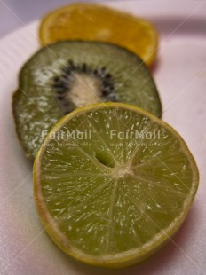 Fair Trade Photo Backlit, Closeup, Colour image, Food and alimentation, Fruits, Get well soon, Health, Kiwi, Orange, Peru, South America, Vertical