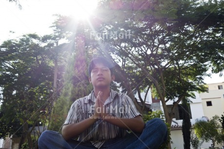 Fair Trade Photo 10-15 years, Activity, Casual clothing, Clothing, Colour image, Day, Horizontal, Latin, Nature, One boy, Outdoor, People, Peru, South America, Tree, Yoga