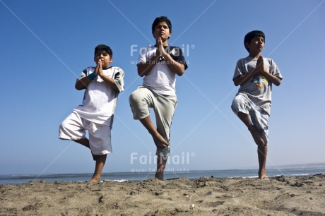 Fair Trade Photo 10-15 years, Activity, Beach, Casual clothing, Clothing, Colour image, Friendship, Group of boys, Horizontal, Latin, People, Peru, Sand, Sea, Seasons, South America, Summer, Together, Yoga