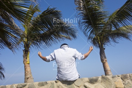 Fair Trade Photo Activity, Casual clothing, Clothing, Colour image, Horizontal, Meditating, One boy, Palmtree, People, Peru, Seasons, Sitting, Sky, South America, Summer, Tree