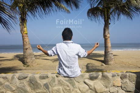 Fair Trade Photo Activity, Casual clothing, Clothing, Colour image, Horizontal, Meditating, One boy, Palmtree, People, Peru, Seasons, Sitting, Sky, South America, Summer, Tree