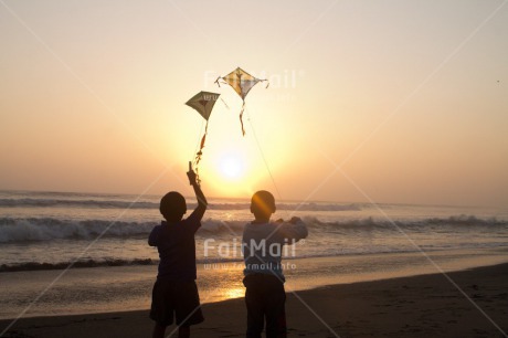 Fair Trade Photo Activity, Backlit, Beach, Clouds, Colour image, Evening, Freedom, Friendship, Hope, Kite, Outdoor, People, Peru, Playing, Sea, Silhouette, Sky, South America, Summer, Sunset, Together, Two boys, Water