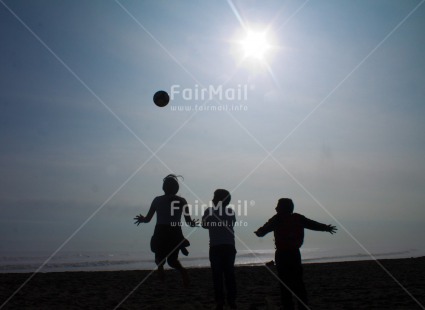 Fair Trade Photo Activity, Backlit, Ball, Colour image, Emotions, Evening, Friendship, Group of boys, Happiness, Outdoor, People, Peru, Playing, Silhouette, Soccer, South America, Sport, Together