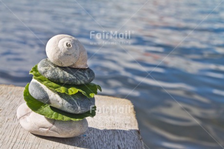 Fair Trade Photo Balance, Colour image, Condolence-Sympathy, Day, Flower, Horizontal, Outdoor, Peru, Pink, South America, Spirituality, Stone, Water, Wellness