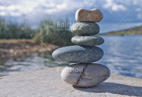 Fair Trade Photo Balance, Colour image, Condolence-Sympathy, Day, Flower, Horizontal, Outdoor, Peru, Pink, South America, Spirituality, Stone, Water, Wellness