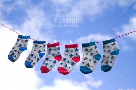 Fair Trade Photo Birth, Blue, Boy, Clouds, Colour image, Horizontal, New baby, People, Peru, Sky, Sock, South America, Star, Washingline