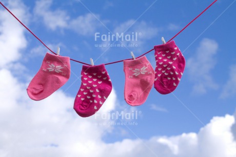 Fair Trade Photo Birth, Blue, Clouds, Colour image, Girl, Horizontal, New baby, People, Peru, Sky, Sock, South America, Washingline