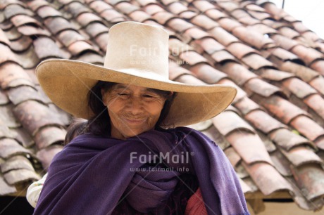 Fair Trade Photo Activity, Clothing, Colour image, Day, Horizontal, House, Latin, Looking away, One woman, Outdoor, People, Peru, Portrait halfbody, Rural, Smiling, Sombrero, South America, Traditional clothing