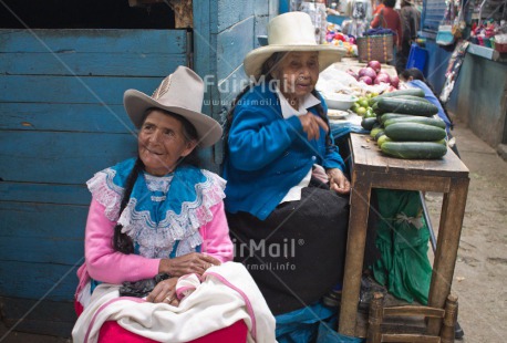 Fair Trade Photo Activity, Clothing, Colour image, Entrepreneurship, Friendship, Hat, Horizontal, Market, People, Peru, Selling, Smiling, Sombrero, South America, Talking, Together, Traditional clothing, Two women