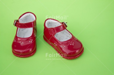 Fair Trade Photo Birth, Closeup, Colour image, Girl, Green, Horizontal, New baby, People, Peru, Red, Shoe, Shooting style, South America