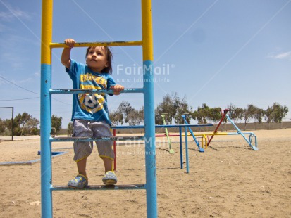 Fair Trade Photo Activity, Climbing, Colour image, Day, Emotions, Growth, Happiness, Health, Horizontal, One boy, Outdoor, People, Peru, Playground, Playing, Smiling, South America, Youth