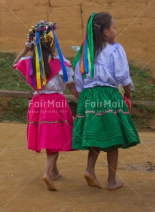 Fair Trade Photo Clothing, Colour image, Dancing, Ethnic-folklore, Festivals and Performances, Friendship, People, Peru, South America, Traditional clothing, Two girls, Vertical