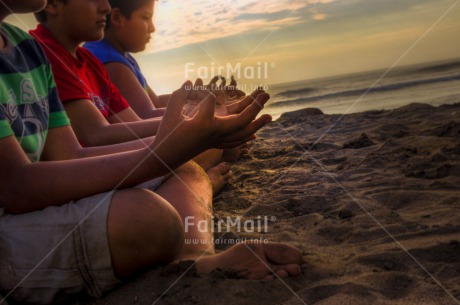 Fair Trade Photo Beach, Colour image, Evening, Group of boys, Horizontal, Peace, People, Sea, Spirituality, Summer, Sunset, Wellness, Yoga