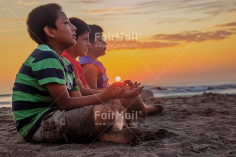 Fair Trade Photo Activity, Beach, Colour image, Evening, Group of boys, Horizontal, Meditating, Peace, People, Sea, Spirituality, Summer, Sunset, Wellness, Yoga