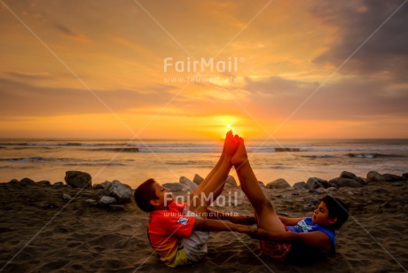 Fair Trade Photo Beach, Colour image, Evening, Group of boys, Horizontal, Peace, People, Sea, Spirituality, Summer, Sunset, Wellness, Yoga