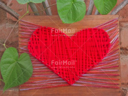 Fair Trade Photo Colour image, Crafts, Fathers day, Green, Heart, Horizontal, Love, Mothers day, Nature, Peru, Plant, Red, South America, Valentines day, Wood, Wool