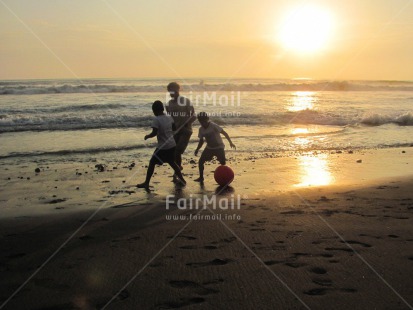 Fair Trade Photo 10-15 years, Activity, Ball, Beach, Children, Colour image, Evening, Holiday, Horizontal, Ocean, People, Peru, Playing, Sand, Sea, Seasons, South America, Summer, Sunset, Water