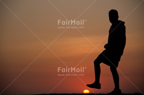 Fair Trade Photo Ball, Boy, Colour image, Horizontal, Outdoor, People, Peru, Shooting style, Silhouette, South America, Sunset