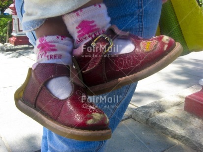 Fair Trade Photo Activity, Baby, Casual clothing, Closeup, Clothing, Colour image, Cute, Daughter, Day, Horizontal, Mother, One girl, Outdoor, People, Peru, Relaxing, Shoe, South America, Street, Streetlife, Transport