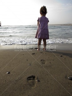 Fair Trade Photo Activity, Beach, Colour image, Day, Looking away, One girl, Outdoor, People, Peru, Portrait fullbody, Sand, Sea, Seasons, South America, Standing, Summer, Vertical, Water