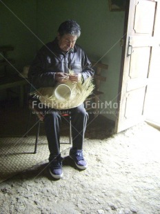 Fair Trade Photo Activity, Clothing, Colour image, Crafts, Day, Fair trade, Hat, Indoor, One man, People, Peru, Rural, South America, Vertical, Working