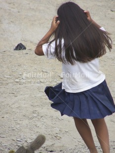 Fair Trade Photo Activity, Clothing, Colour image, Day, Looking away, One girl, Outdoor, People, Peru, Portrait fullbody, Seasons, South America, Streetlife, Summer, Uniform, Vertical