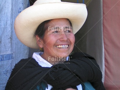 Fair Trade Photo 35-40 years, Activity, Clothing, Colour image, Dailylife, Hat, Horizontal, Latin, Looking away, Multi-coloured, One woman, Outdoor, People, Peru, Portrait headshot, Rural, Smile, Smiling, Sombrero, South America, Streetlife