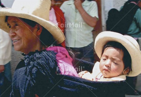 Fair Trade Photo Activity, Clothing, Colour image, Dailylife, Ethnic-folklore, Family, Horizontal, Multi-coloured, One baby, One woman, Outdoor, People, Peru, Portrait headshot, Relaxing, Rural, Sleeping, Sombrero, South America, Streetlife, Traditional clothing